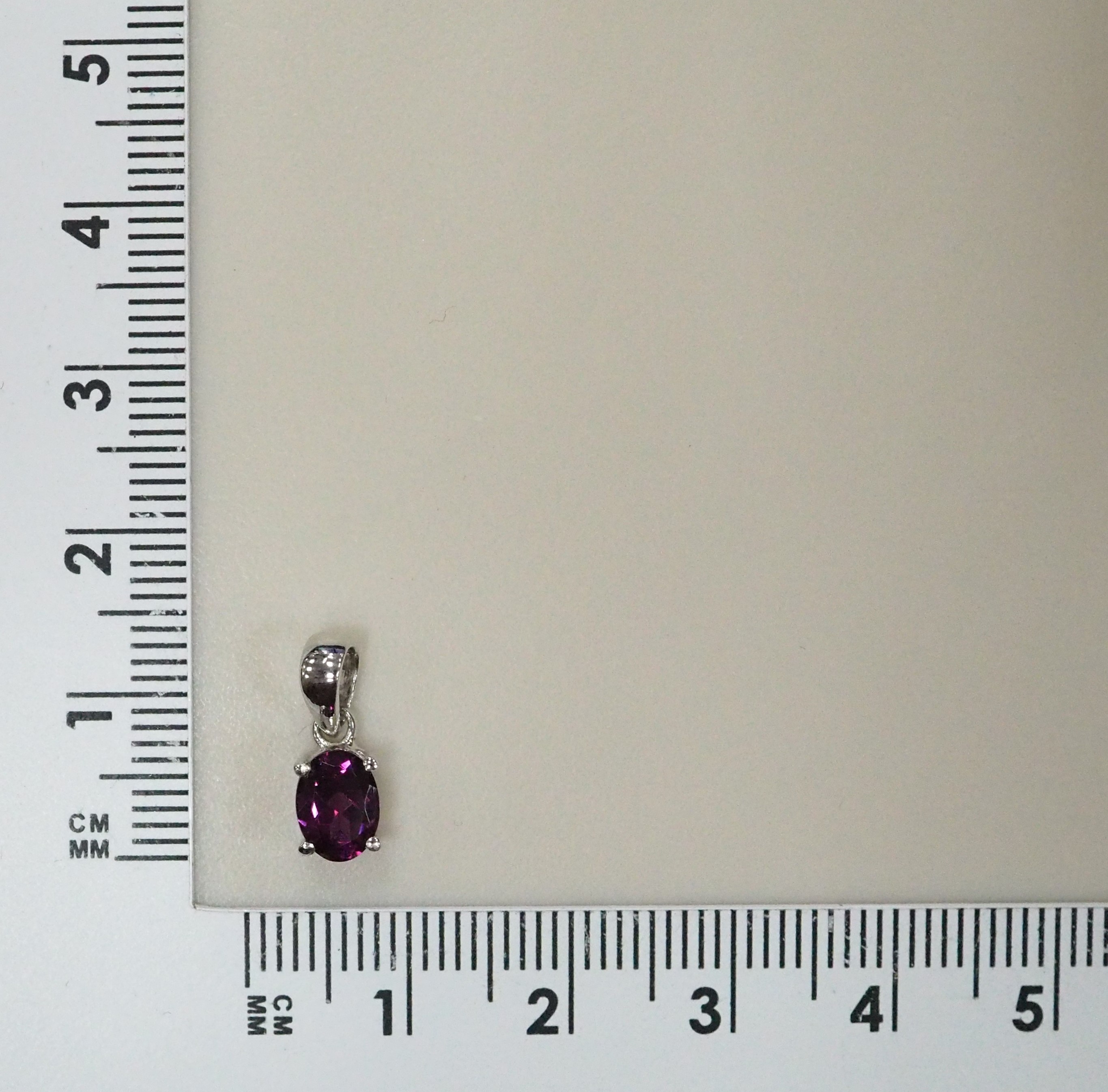 Серебряная подвеска с гранатом Умбалит